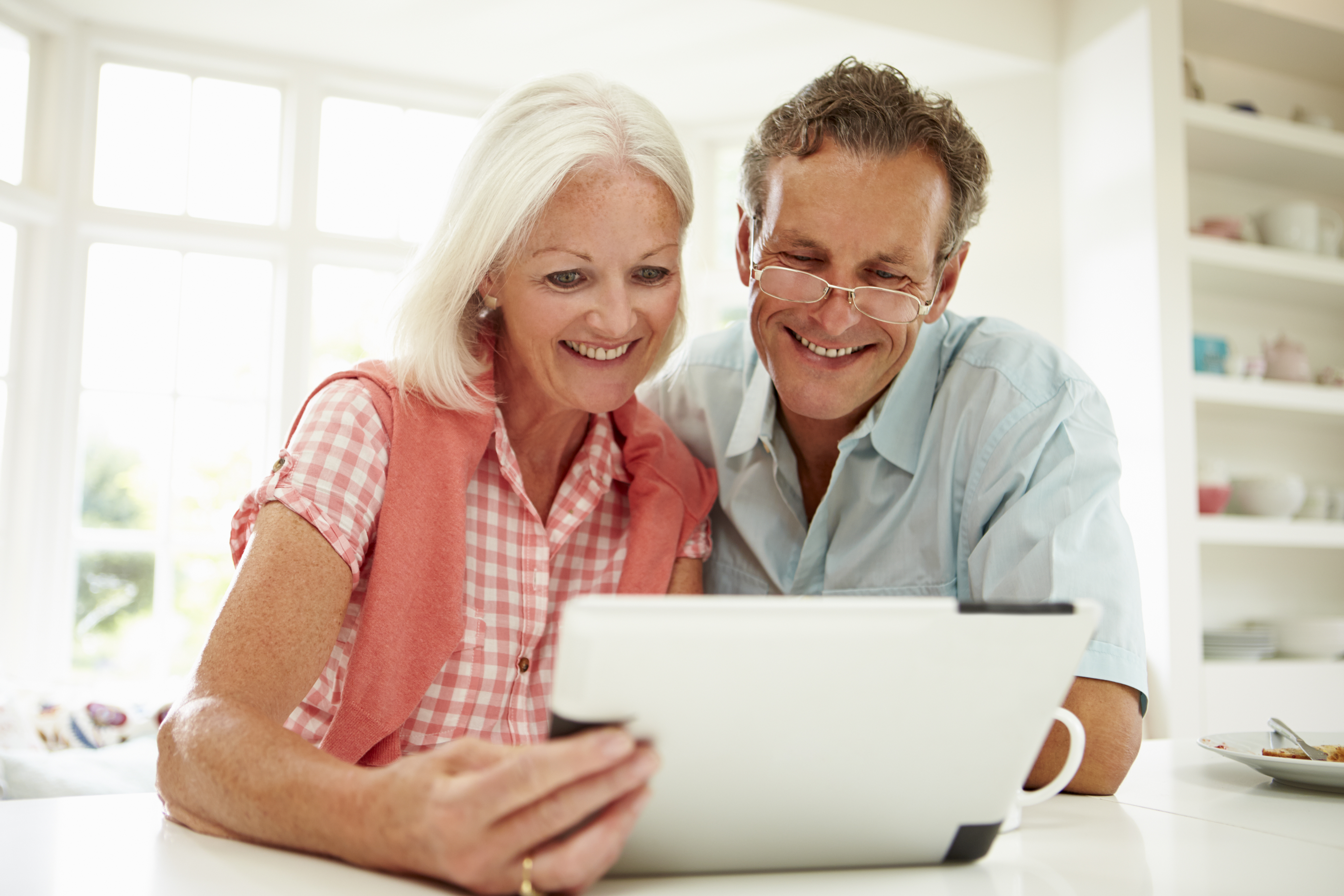 Couple on iPad writing a Last Will and Testament